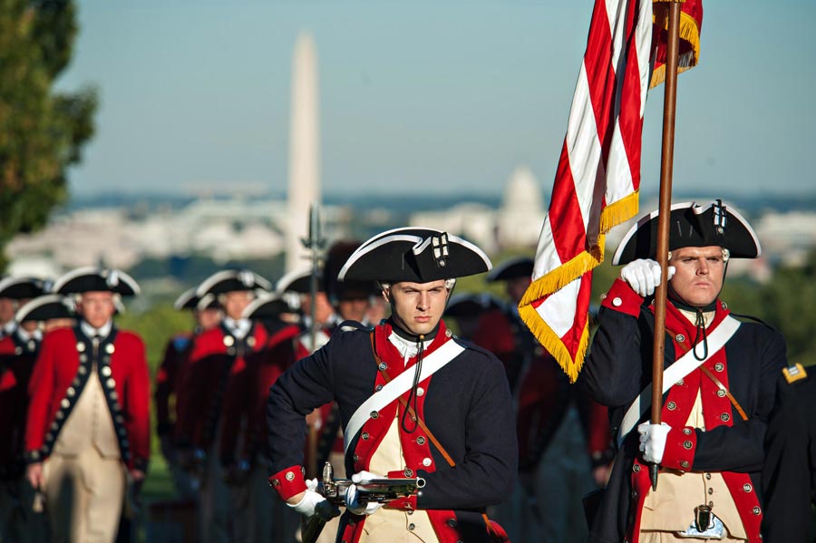 Soldiers from 3rd Infantry Regiment 'The Old Guard,' and Fife and Drum Corps, perform during Twilight Tattoo and Outstanding Civilian Service Award ceremony