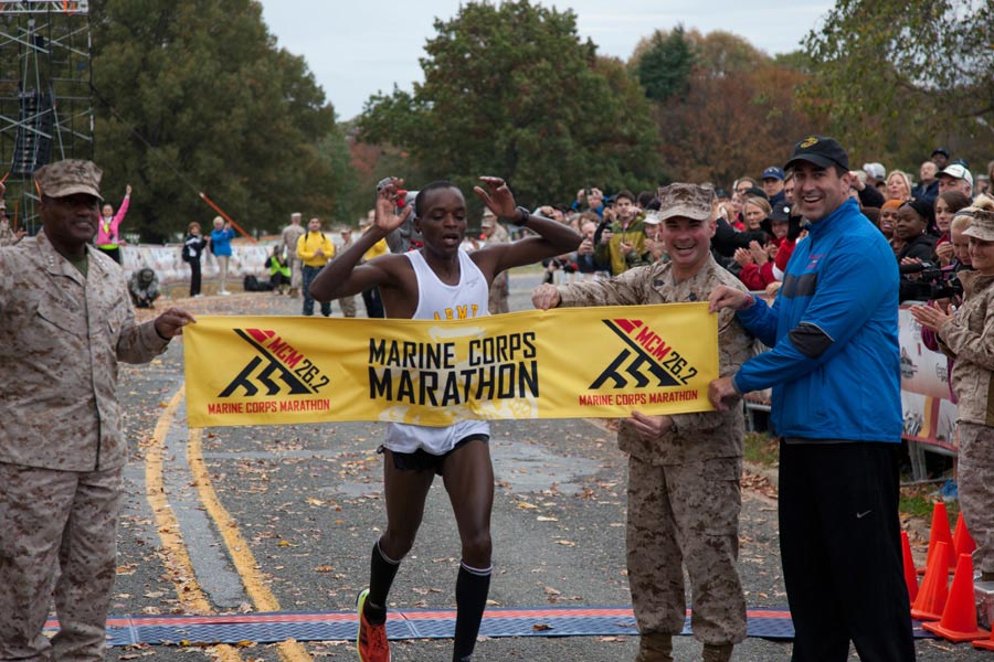 Specialist Augustus Maiyo, with U.S. Army team, was first runner to cross finish line during 37th Marine Corps Marathon