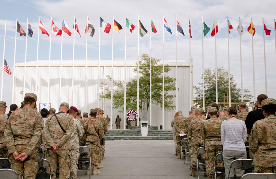 Soldiers and civilians observe moment of silence during 9/11 Remembrance Ceremony
