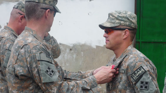 Staff Sergeant Romesha receiving bronze star