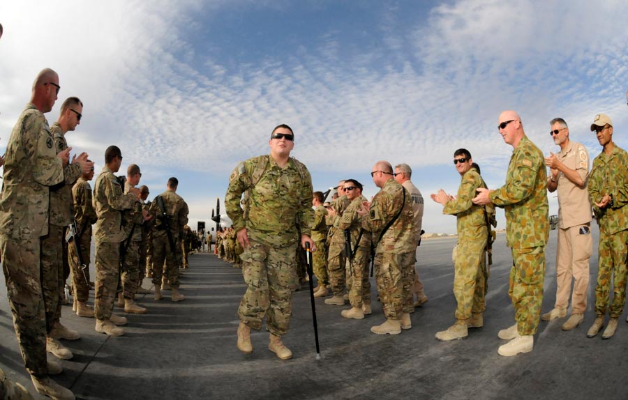 Specialist Lyle Yantz and several other service members participating in Operation Proper Exit