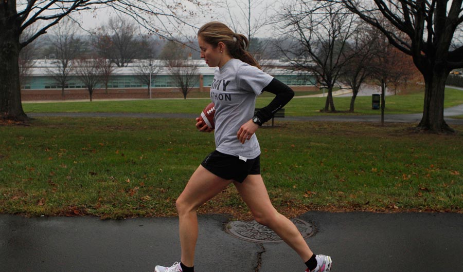 Class of 2014 Cadet Mackenzie Vaughn, a civil engineering major, running