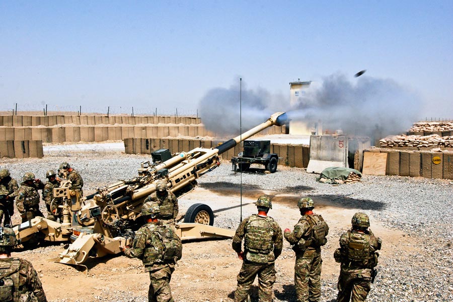 Paratroopers with 173rd Airborne Brigade Combat Team, fire an M777A2 cannon during firing demonstration